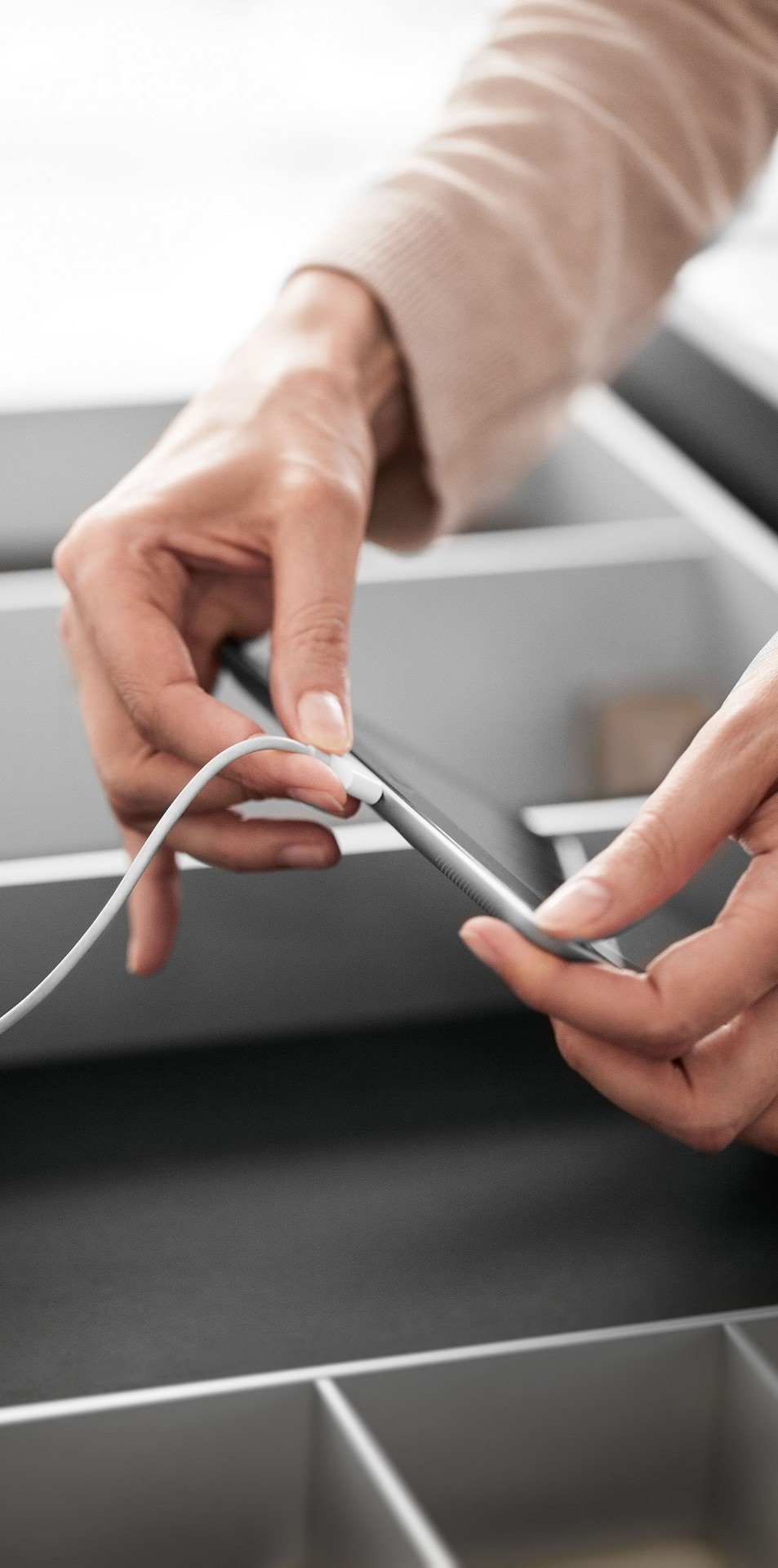 USB charging station in drawers and pull-outs for loading up iPads and iPhones in the kitchen